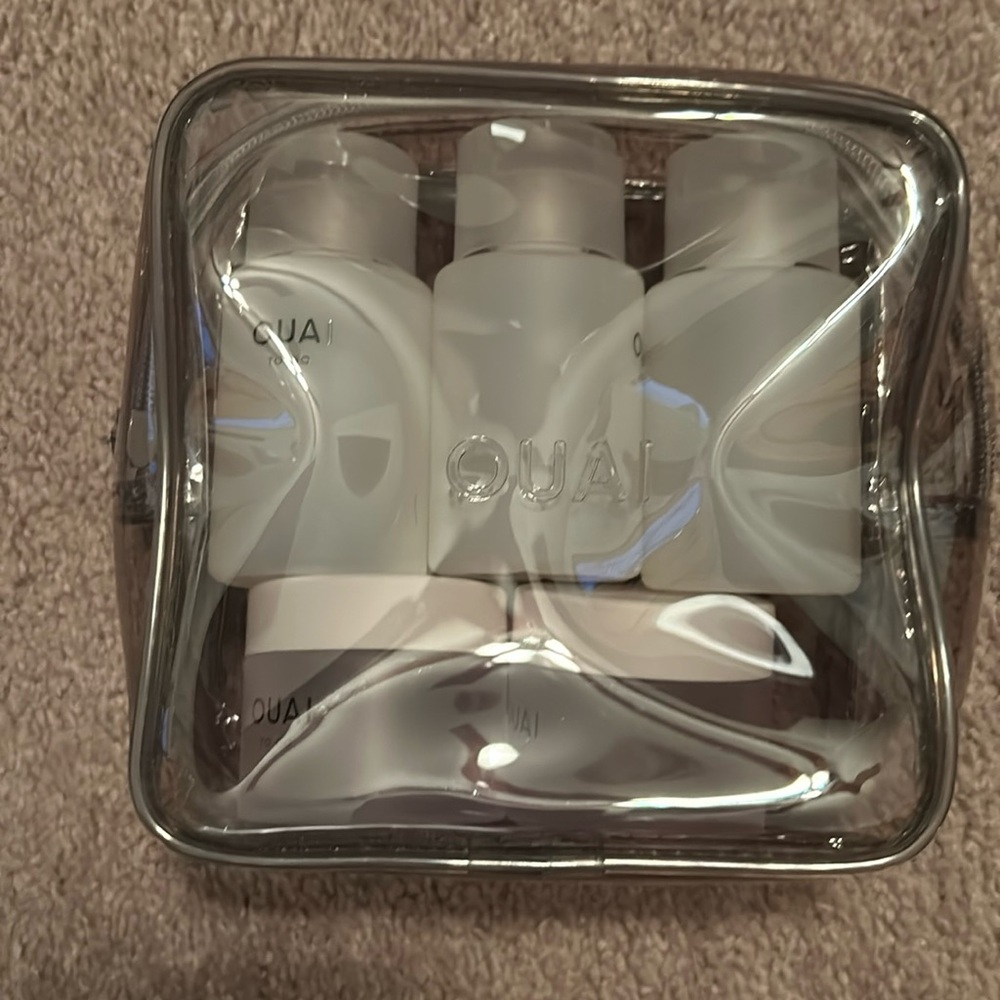 Ouai travel bag with bottles/ containers